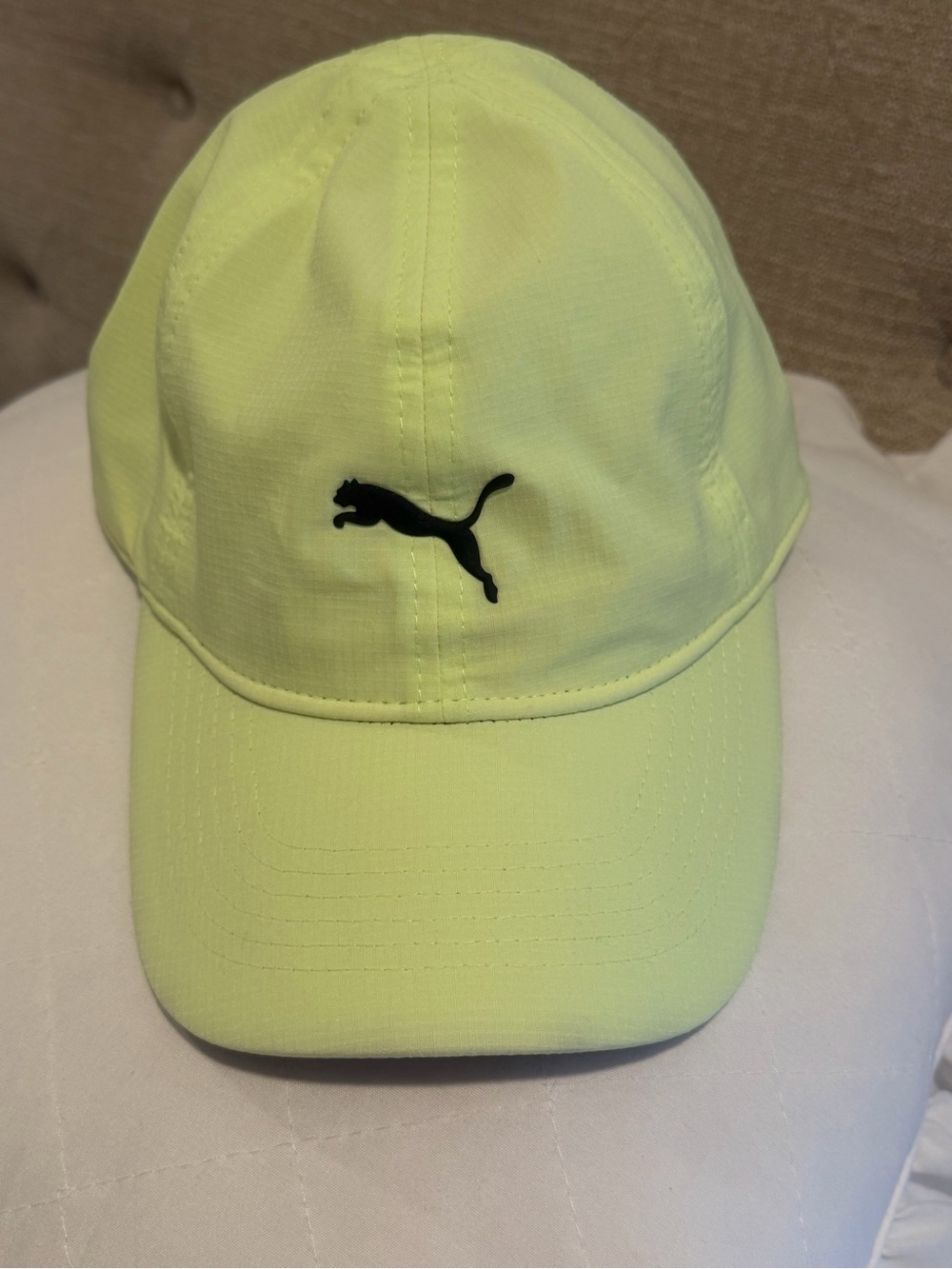 Puma Neon Lime Running Cap III featuring an embroidered black cat logo